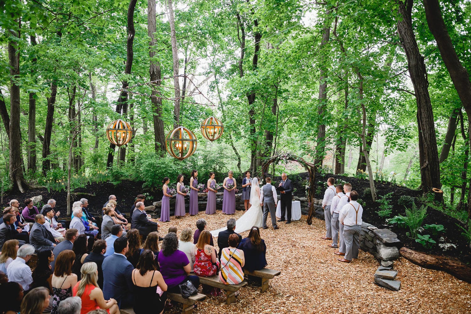 Stone Mill Inn Wedding Ceremony in the woods